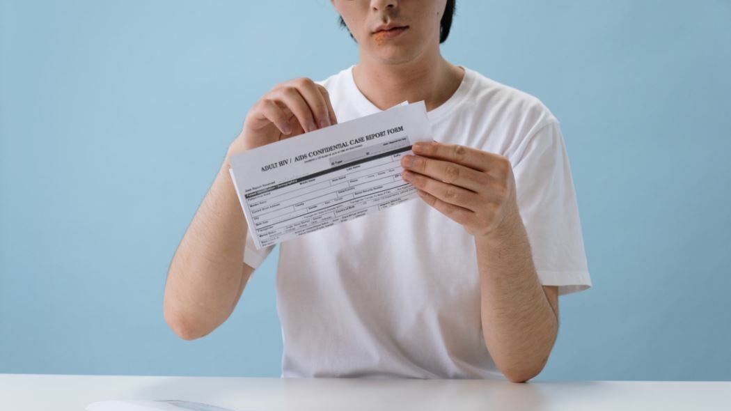 person with a paper