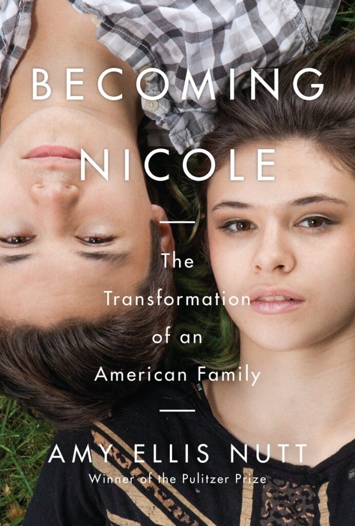 Book cover of “Becoming Nicole” by Amy Ellis Nutt showing two teenagers lying on grass, one upside down, with title text centered.