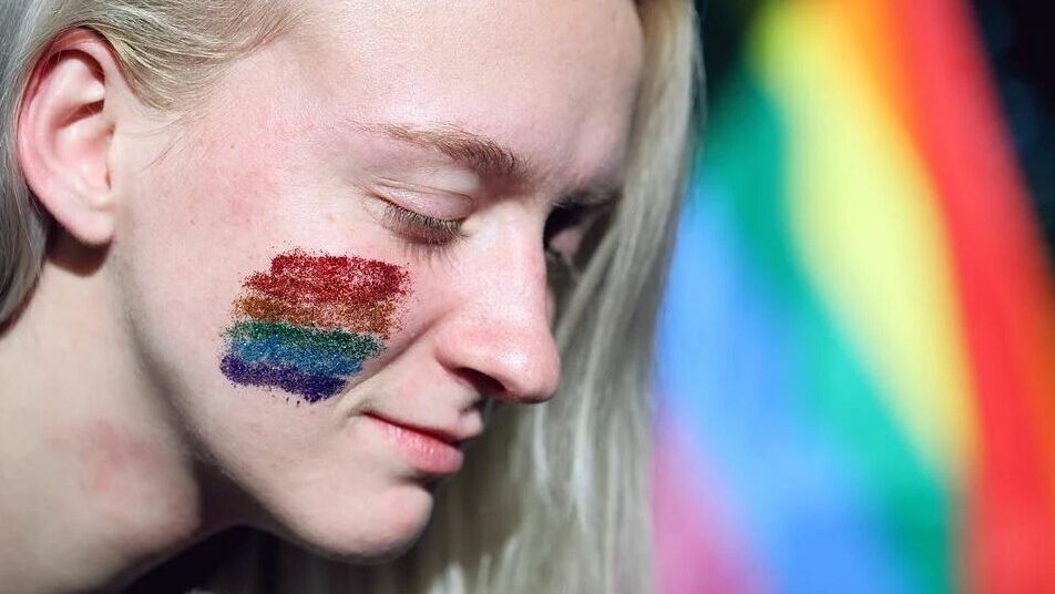 woman with LGBT flag