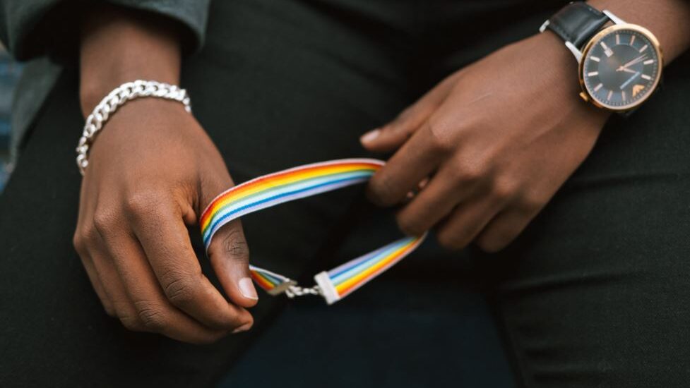 Man with rainbow bracelet