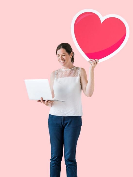 a woman with a heart and laptop