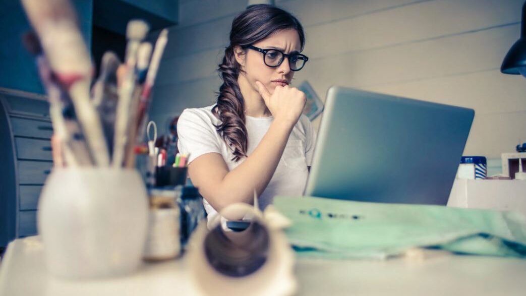 woman front of a laptop