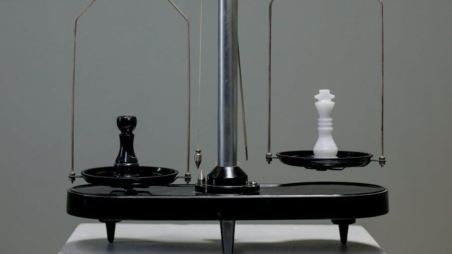 A symbolic image of a weighing scale with chess pieces—a black pawn weighed down and a white queen elevated.