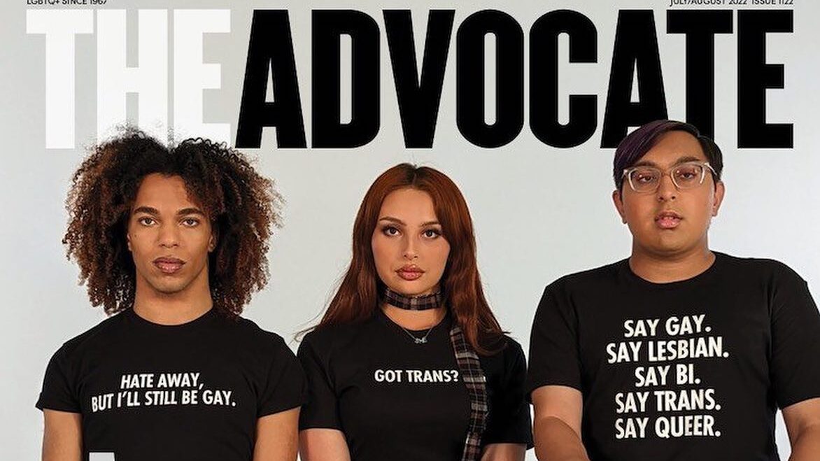 Zoey Luna sits between two LGBTQ+ advocates on The Advocate’s 2022 cover, all wearing bold activist T-shirts.