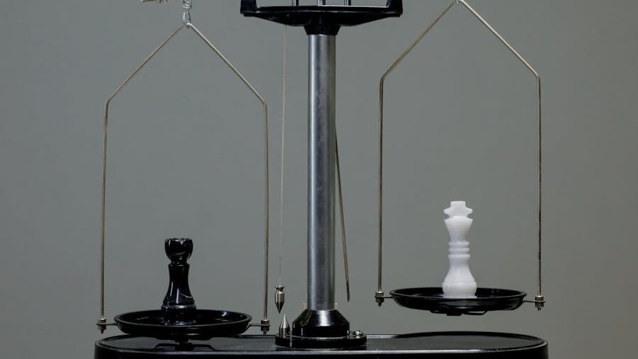 black rook and a white king placed on opposite sides of a balance scale.
