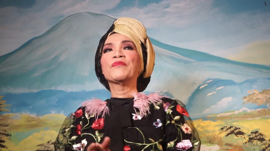 Dorce Gamalama speaking in a personal video message, reflecting her role as an Indonesian transgender actress, presenter, and public figure.