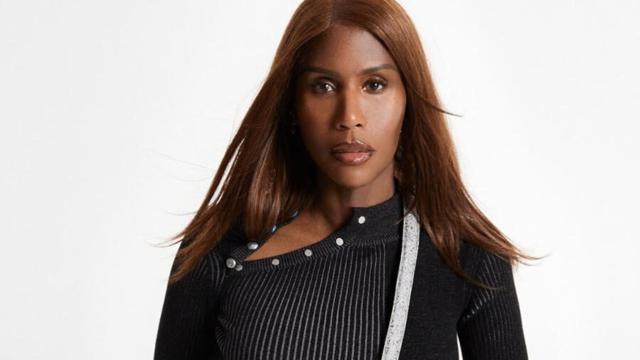 Honey Dijon poses in a black outfit with a white Burrow Bag across her shoulder for an Off-White fashion campaign.