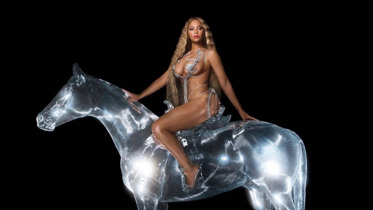 Beyoncé poses on a translucent silver horse against a black background for the cover artwork of Renaissance.